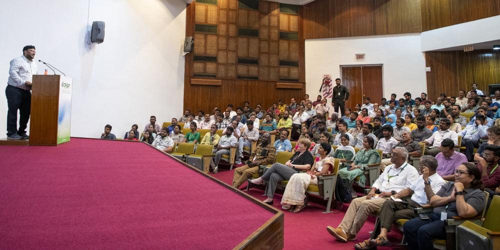 A packed auditorium.