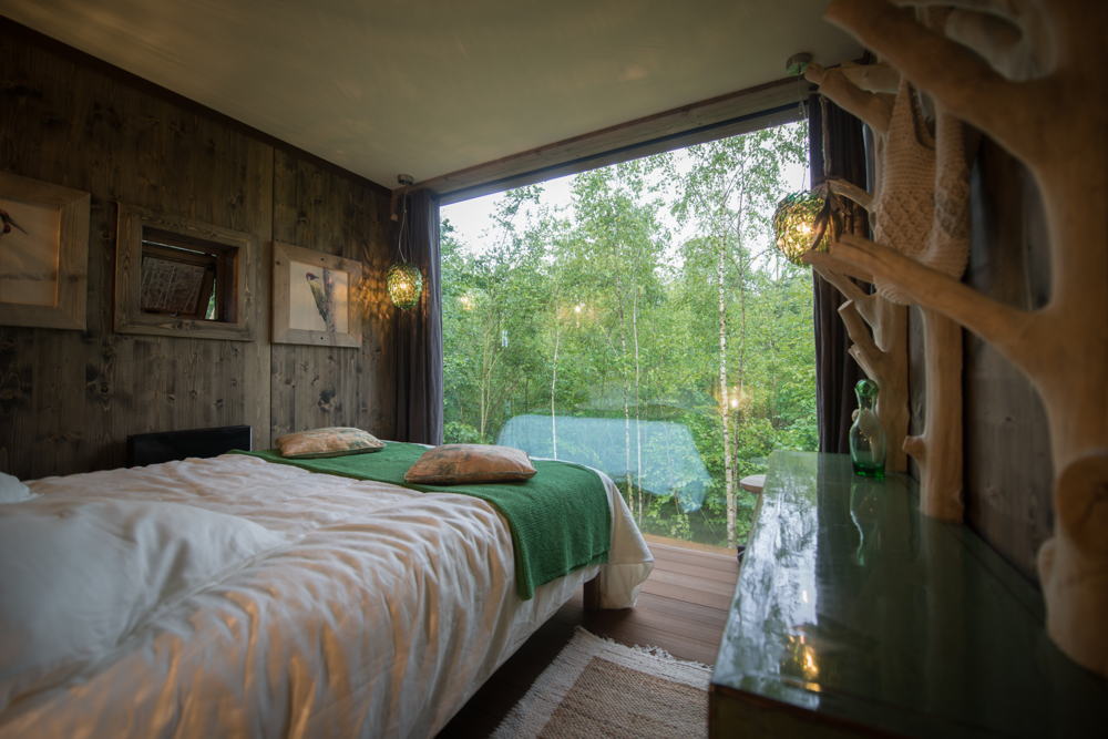 Forest Resort Your Nature treeloft slaapkamer uitzicht