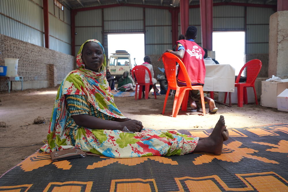 Treza Noyul, a South Sudanese returnee, waits for her turn to seek medical consultation in a mobile clinic run by MSF at the Riverside transit site in Renk town, Upper Nile State, South Sudan. She is one of the many affected by the conflict in Sudan, which erupted in April 2023. Photographer: Nasir Ghafoor | Location: South Sudan |Date: 07/06/2023 Treza Noyul, a South Sudanese returnee, waits for her turn to seek medical consultation in a mobile clinic run by MSF at the Riverside transit site in Renk town, Upper Nile State, South Sudan. She is one of the many affected by the conflict in Sudan, which erupted in April 2023. Photographer: Nasir Ghafoor | Location: South Sudan |Date: 07/06/2023