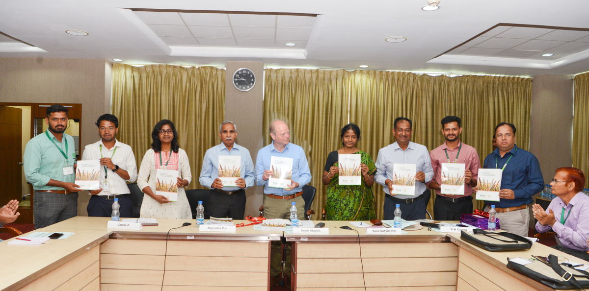 Scientists unveiling the monograph during the launch of Pearl Millet scientists' field day visit at ICRISAT. 