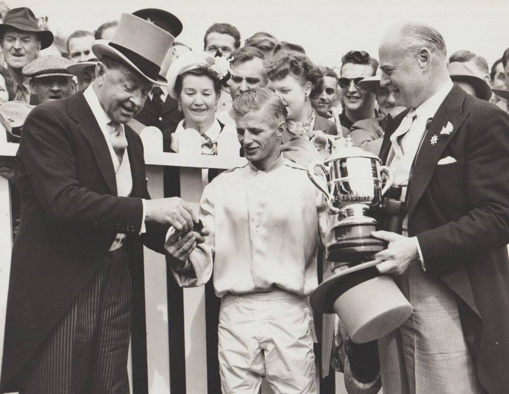 Jockey Alf Bavington celebrates winning the 92nd King's Plate with Major Factor on May 26, 1951 (Photo courtesy of Georgina MacDougall)