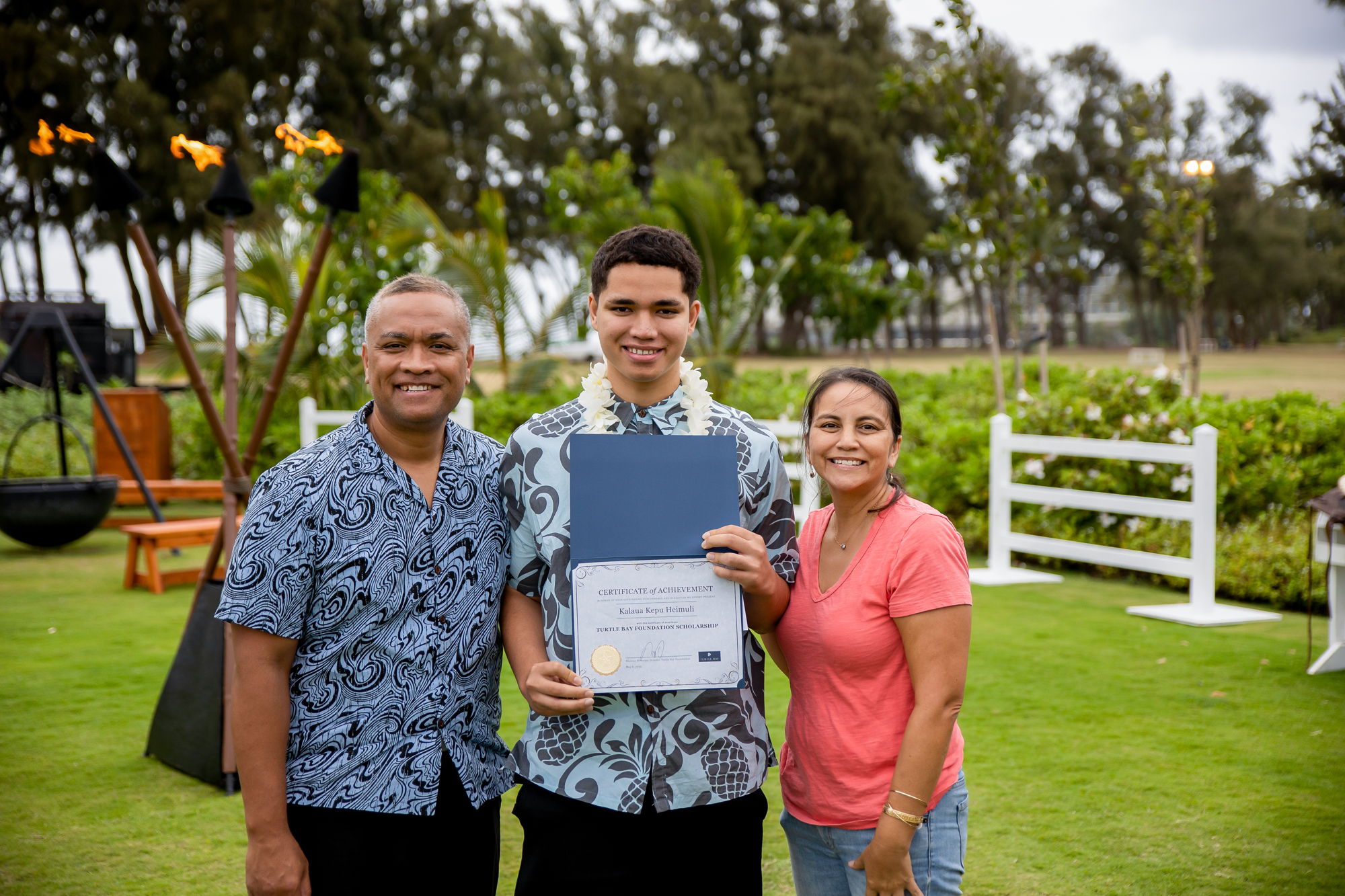 Scholarship recipient with family