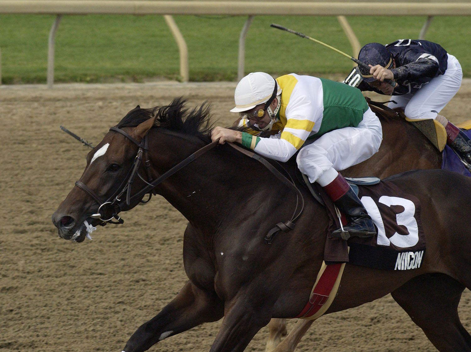 Niigon and jockey Rob Landry winning the 2004 Queen's Plate (Michael Burns Photo)