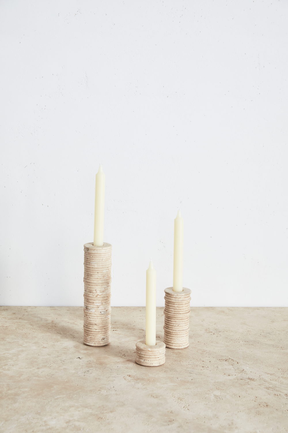 Ribbed Candle Holder - Travertine, $150-$350 by Kelly Wearstler I www.kellywearstler.com (Image credit: Mark Durling)