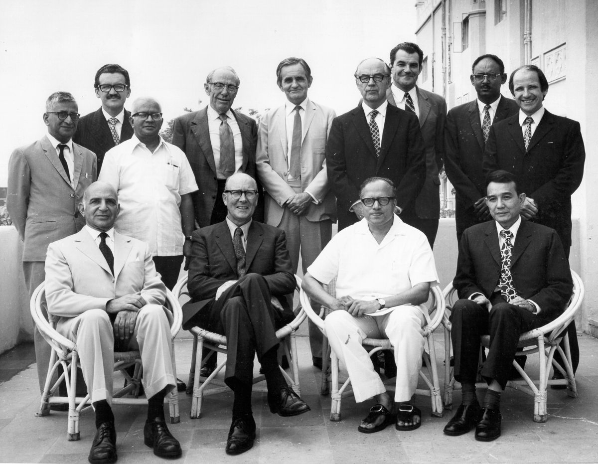 The First Governing Board Meeting. ( From left to right) Standing: UK Rao, Rubens Vaz Da Costa, T Swaminathan, DW Thome, AR Melville, RW Cummings, MH Mengesha, K Lampe. Sitting: RH Demuth, CF Bentley, MS Swaminathan, and DL Umali.