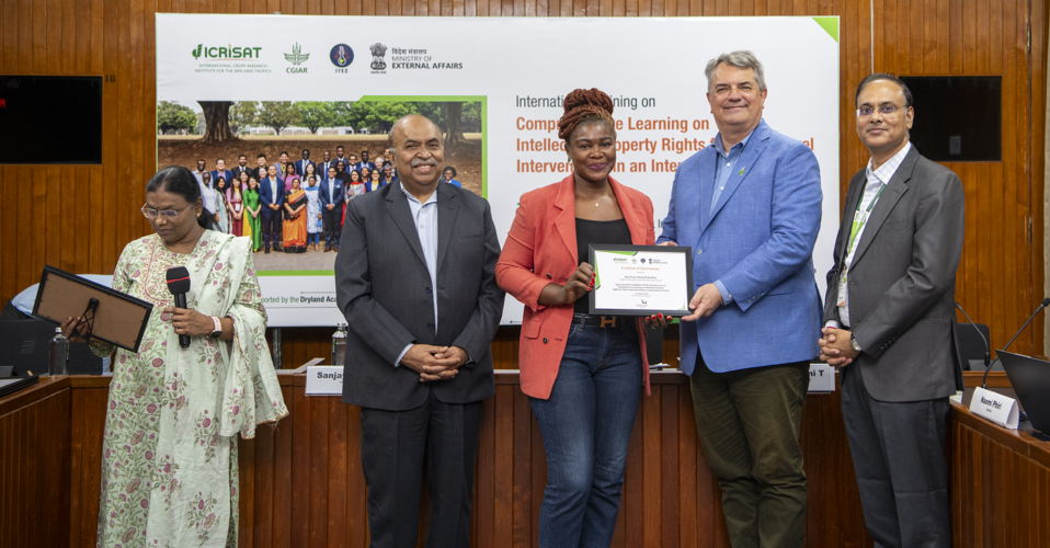 CGIAR participants receiving their certificates: Prisca Dia from Africa Rice, Cote D'ivoire