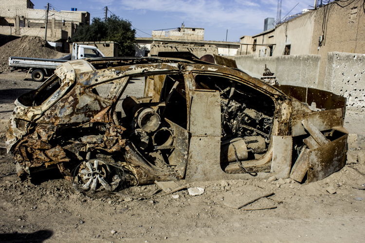 A car that was used for a suicide attack during the offensives in Al Raqqa city. This car might still be a threat for the residents who are going back home. Al Mishlab, east of Raqqa. Credit: Diala Ghassan/MSF