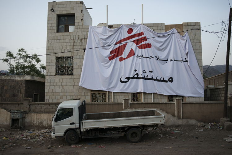 An MSF flag hangs on one of MSF's facilities in Qataba, Al Dhale governorate. Airstrikes and ground shelling have hit civilian facilities in the past, and MSF demarcates all their facilities and vehicles to keep staff and patients safe. Yemen, July, 2014. Credit MSF