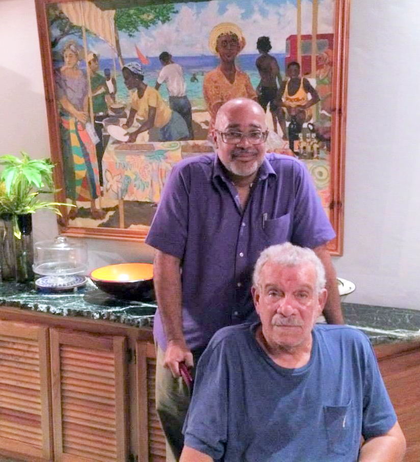 OECS Director General, Dr. Didacus Jules, with friend, Sir Derek Walcott, at his home in Saint Lucia.