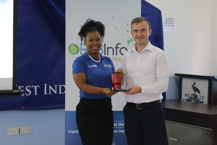 Ms. Abiola Sandiford, Information Officer in the Statistics Services Unit, makes presentation to UNICEF representative.