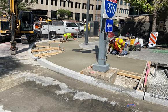 New sidewalk recently placed at Fifth Avenue and Ross Street