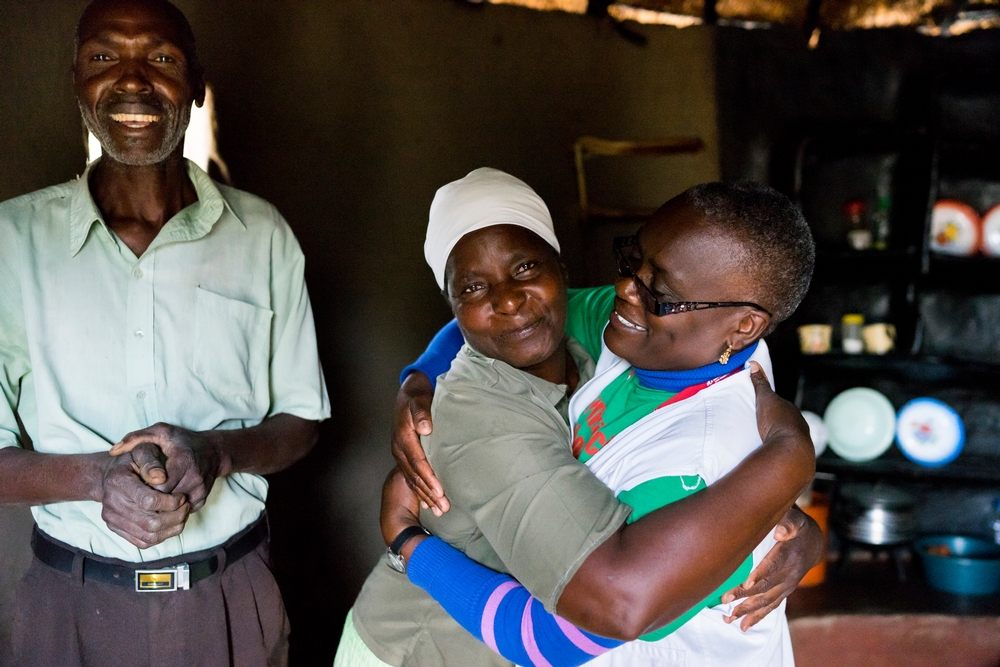 Florence hugs Medecins Sans Frontieres (MSF) nurse mentor Sister Tendai. 

Florence has cervical cancer and needs to go to a bigger hospital to get surgery and her uterus removed, today MSF as brought good news, cancer has not spread. But the family is anxious because they do not have any money for medical care, MSF will help them with the surgery. Photographer: Melanie Wenger/COSMOS