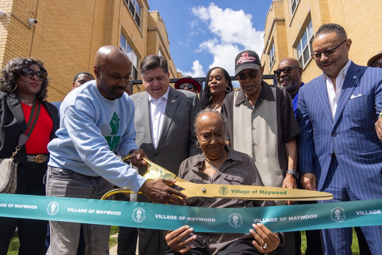 Gov. Pritzker joins Black Men United for a ribbon cutting of a new affordable housing facility in Maywood. (Office of the Governor)