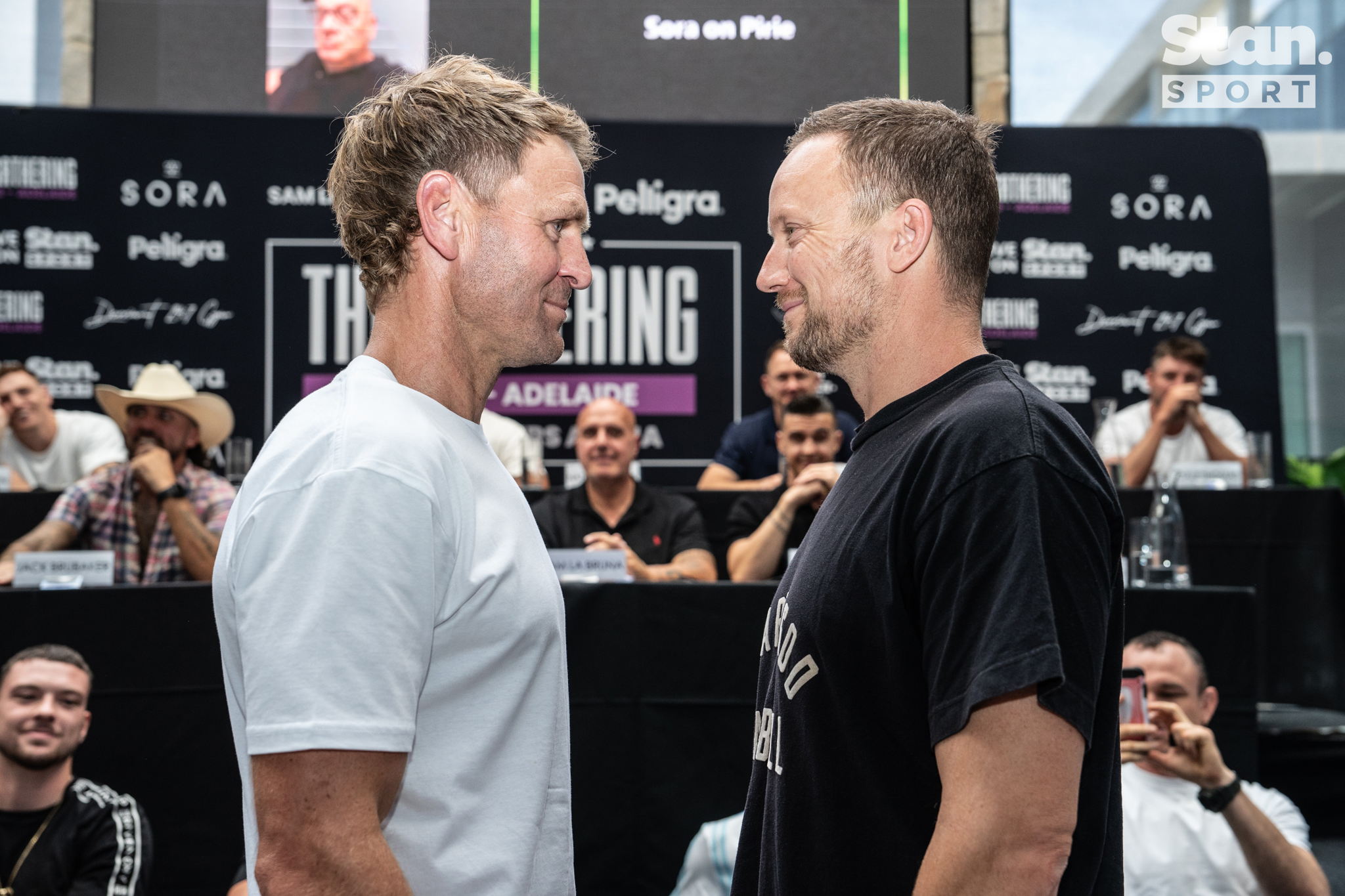 Kane Cornes (L) stares down his opponent Nathan Brown (R) Kane Cornes (L) stares down his opponent Nathan Brown (R)