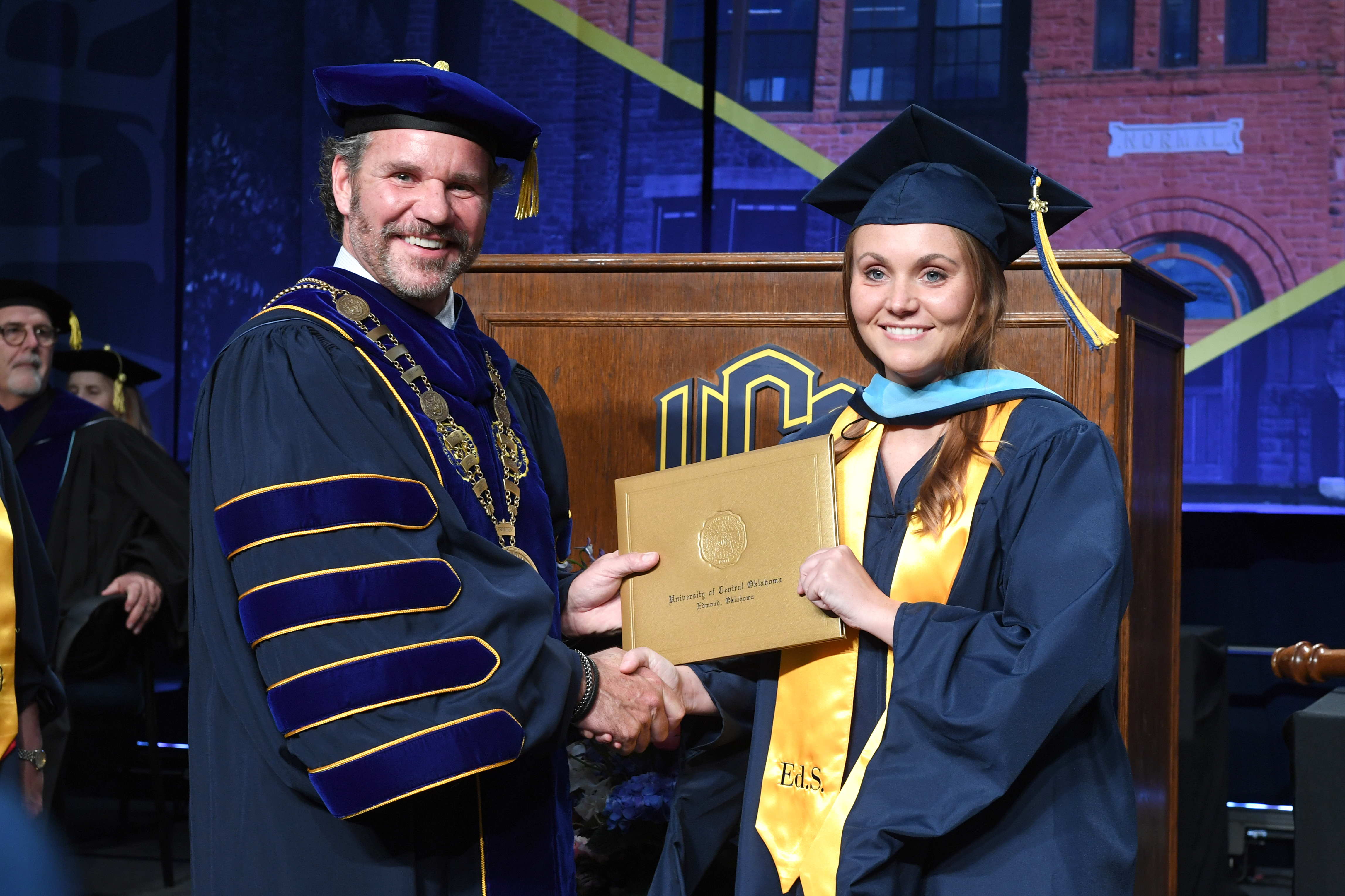 UCO President Todd G. Lamb and Alisha Sampson at the UCO Spring 2025 Commencement ceremony. UCO President Todd G. Lamb and Alisha Sampson at the UCO Spring 2025 Commencement ceremony.