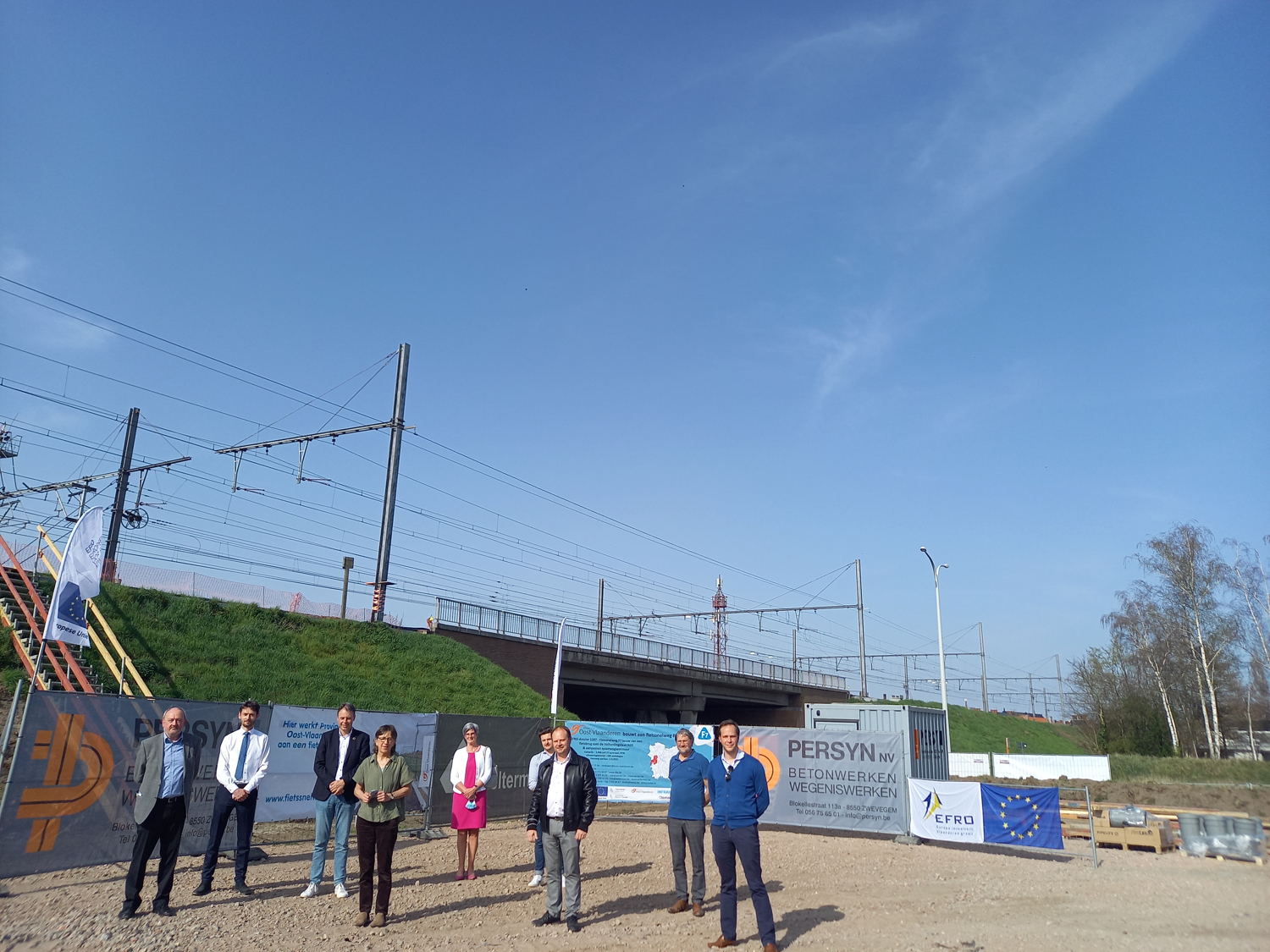 Werner Van den Stockt (EFRO), Pieter Hendrix (POV), Jan Vermeulen (burgemeester Deinze), Riet Gillis (gedeputeerde POV), Veerle Aelterman (Aelterman-Persyn aannemer), Tom De Soete (SBE), Bart Van Thuyne (schepen Deinze), Johan Cornelis (schepen Deinze) Marijn Libbrecht (Infrabel).