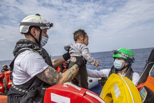 Roughly 200 people from two boats in distress were rescued on the morning of May 9. Everyone is now safe on board the Geo Barents while we continue the search for more boats in distress. Right after the rescue we saw the Libyan Coast Guard navigating at a very close distance from the Geo Barents. Copyright: Anna Pantelia/MSF