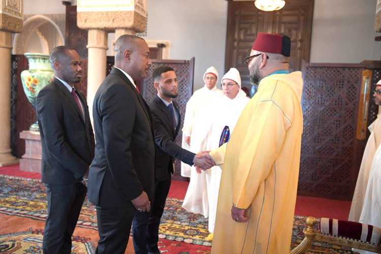 Mr. Christian-Amir Wayne, Second Secretary and Economic Attaché greets His Majesty King Mohammed VI on January 22nd 2020.