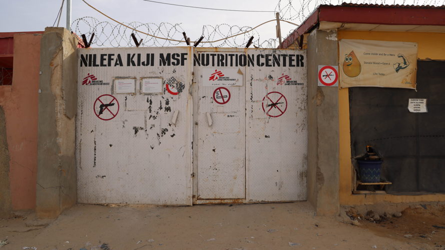 The entrance to the MSF run Nilefa Kiji Nutrition center in Maiduguri, Nigeria. On a yearly basis, MSF team in Maiduguri do observe that there are usually spikes in cases of malnutrition during the lean season but it was different in 2022 when the increase in the number of children with malnutrition was noticed before the onset of the ‘peak season’. Copyright MSF