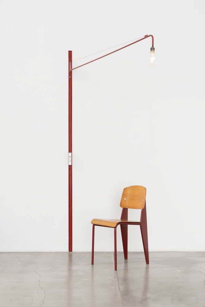 Swing-jib lamp, ca. 1951 and Metrolpole no.305 chair, ca. 1950 by Jean Prouvé from Galerie Patrick Seguin at Design Miami Basel 2024 (Image courtesy of Galerie Patrick Seguin)