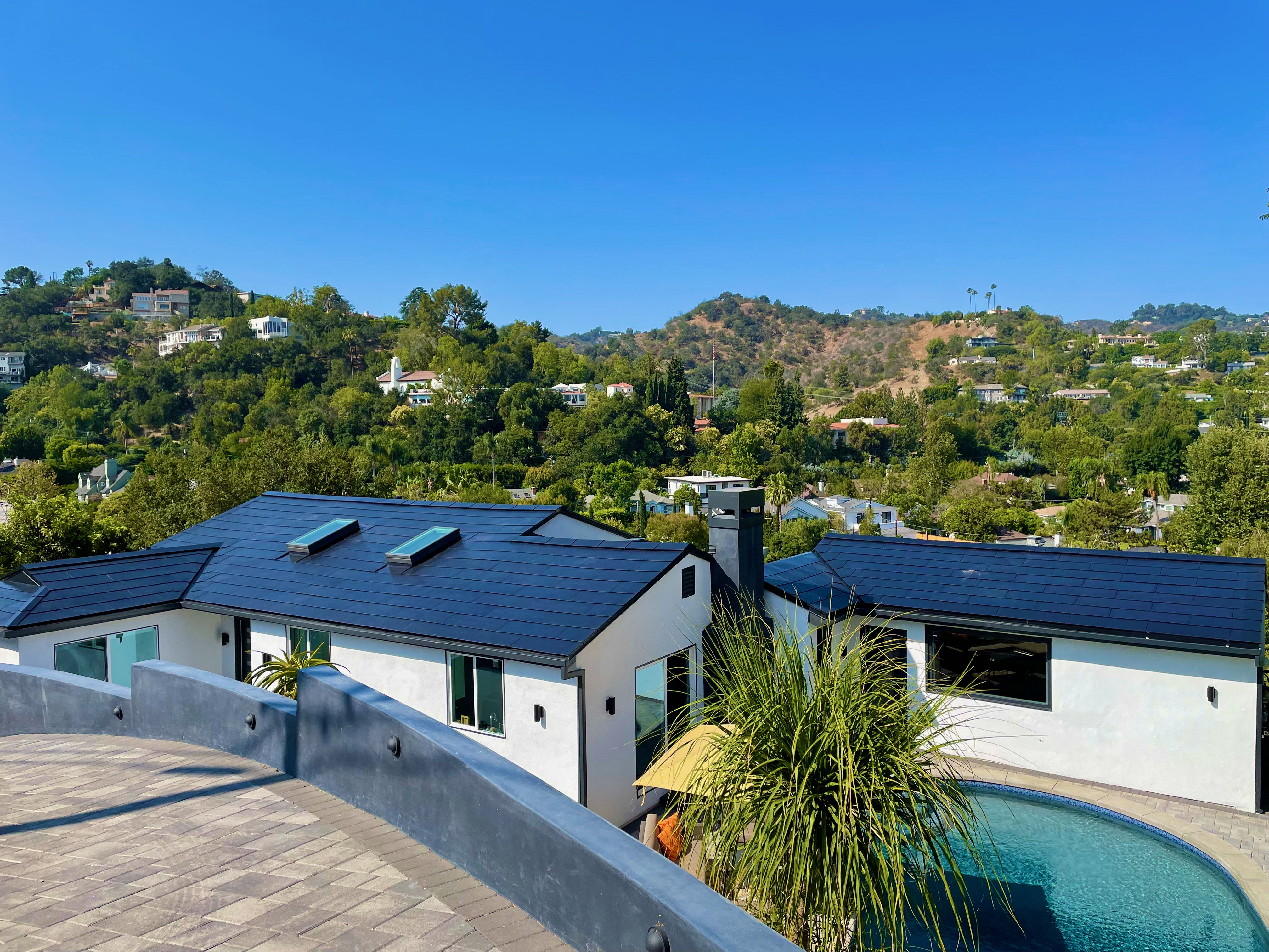 ScooterMusic Studio Building Far Right Note Tesla Battery Installation on both roofs