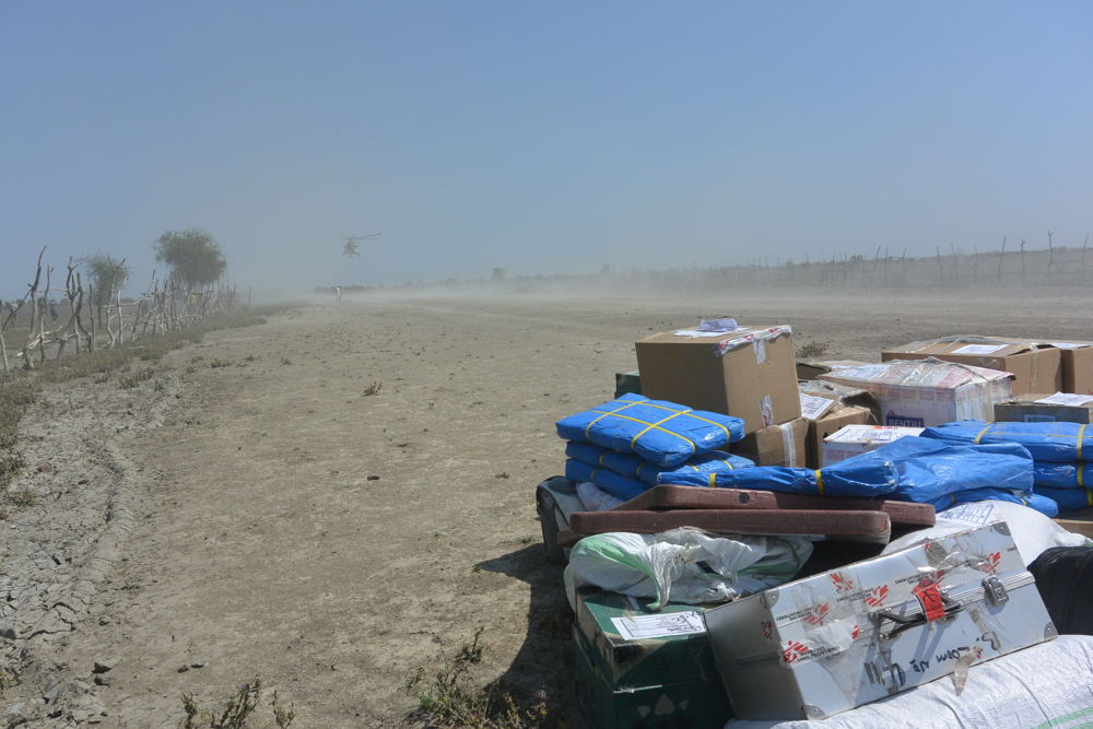 A helicopter takes off after dropping medical and humanitarian items to support an MSF emergency team in Riang, Jonglei State.  Copyright: Damaris Giuliana/MSF