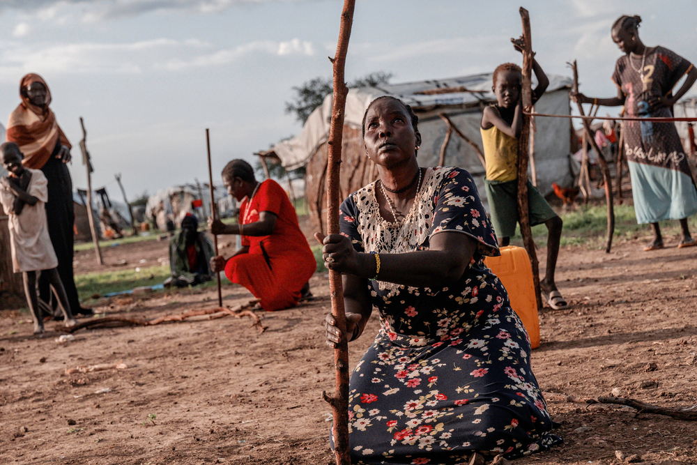 Five families have recently arrived in Abyei following a long perilous journey through regions torn apart by conflict in Sudan. The older generation came originally from Warrap state in South Sudan, but the two younger generations were born in Sudan. Photographer: Sean Sutton| Location: South Sudan | Date: 07/08/2023 