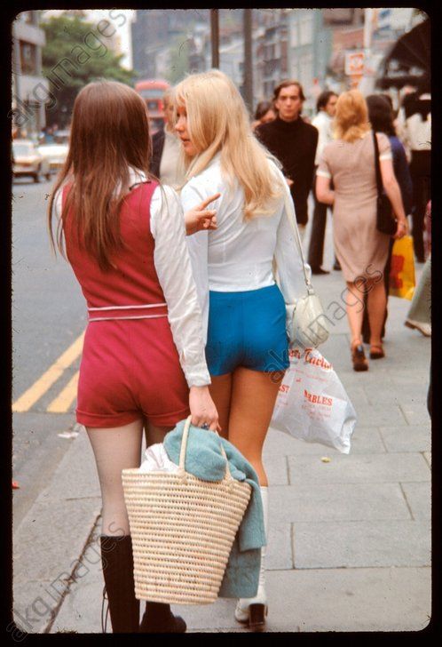 Two young girls on a shopping trip along the King’s Road, London, 1971. AKG249653