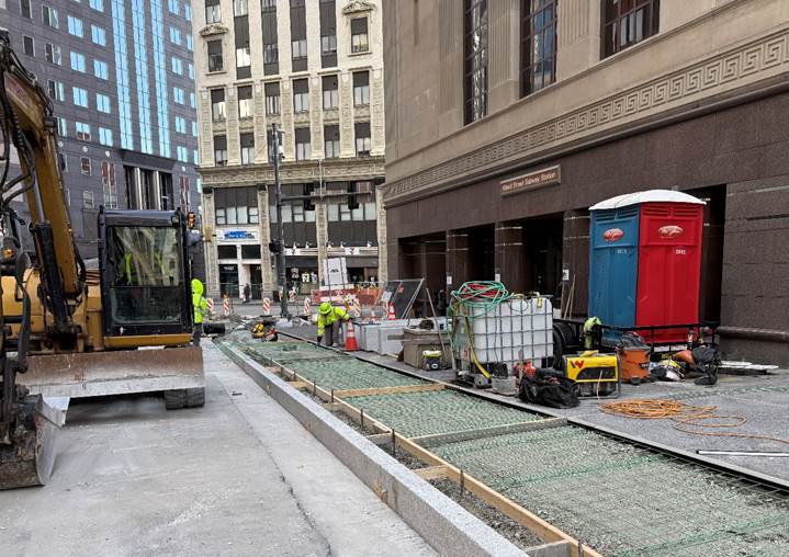 New granite curb recently placed at Sixth Avenue and Wood Street