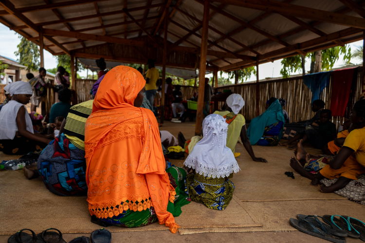 Living with HIV/Aids through Conflict and Displacement - Macomia Mothers and children wait in the paediatric triage area at MSF’s Clinic in Nanga, Macomia, Cabo Delgado. Out of seven health posts in Macomia District functioning before the conflict, only one is working, as the other six were destroyed by armed groups. MSF runs three clinics in Macomia, Nanga being one of them. Photographer: Martim Gray Pereira Living with HIV/Aids through Conflict and Displacement - Macomia Mothers and children wait in the paediatric triage area at MSF’s Clinic in Nanga, Macomia, Cabo Delgado. Out of seven health posts in Macomia District functioning before the conflict, only one is working, as the other six were destroyed by armed groups. MSF runs three clinics in Macomia, Nanga being one of them. Photographer: Martim Gray Pereira