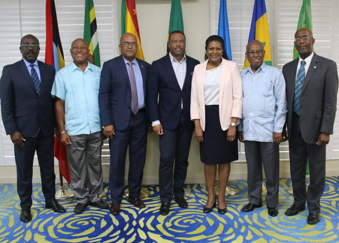 Group photo of Foreign Ministers and their representatives present at the meeting.