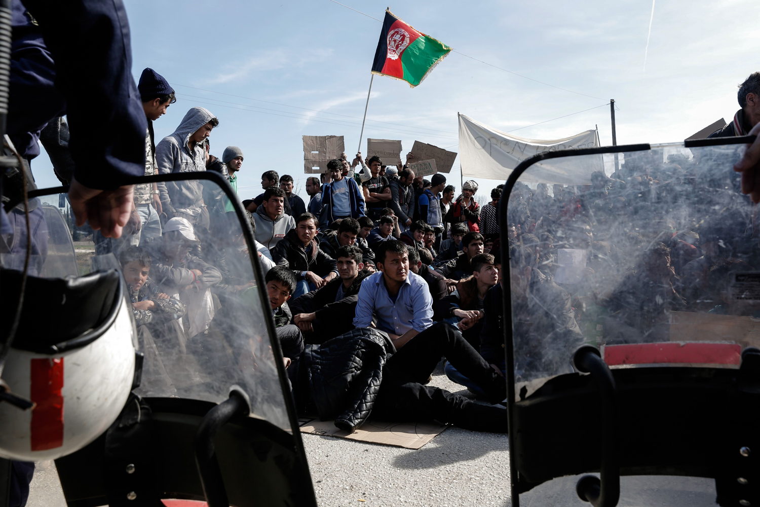 Konstantinos Tsakalidis/SOOC.  Afghans protest next to the Greek-Macedonian (FYROM) border near the northern Greek village of Idomeni. The FYROM authorities have closed the border to Afghan refugees.