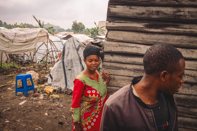 Copyright: Philémon Barbier Countries: Democratic Republic of Congo Date taken / Date Recorded: 06 January, 2024 Caption / Description: Elie Destin, 21, with his wife Alice Feza, 19, near their shelter in the Kanyaruchinya IDP site, north of Goma, North Kivu, Democratic Republic of Congo, 4 January 2024.