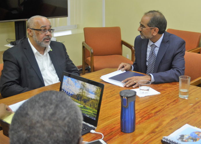 Pawan G. Patil, World Bank Blue Economy Team Leader discusses the Project with OECS Director General, Didacus Jules.