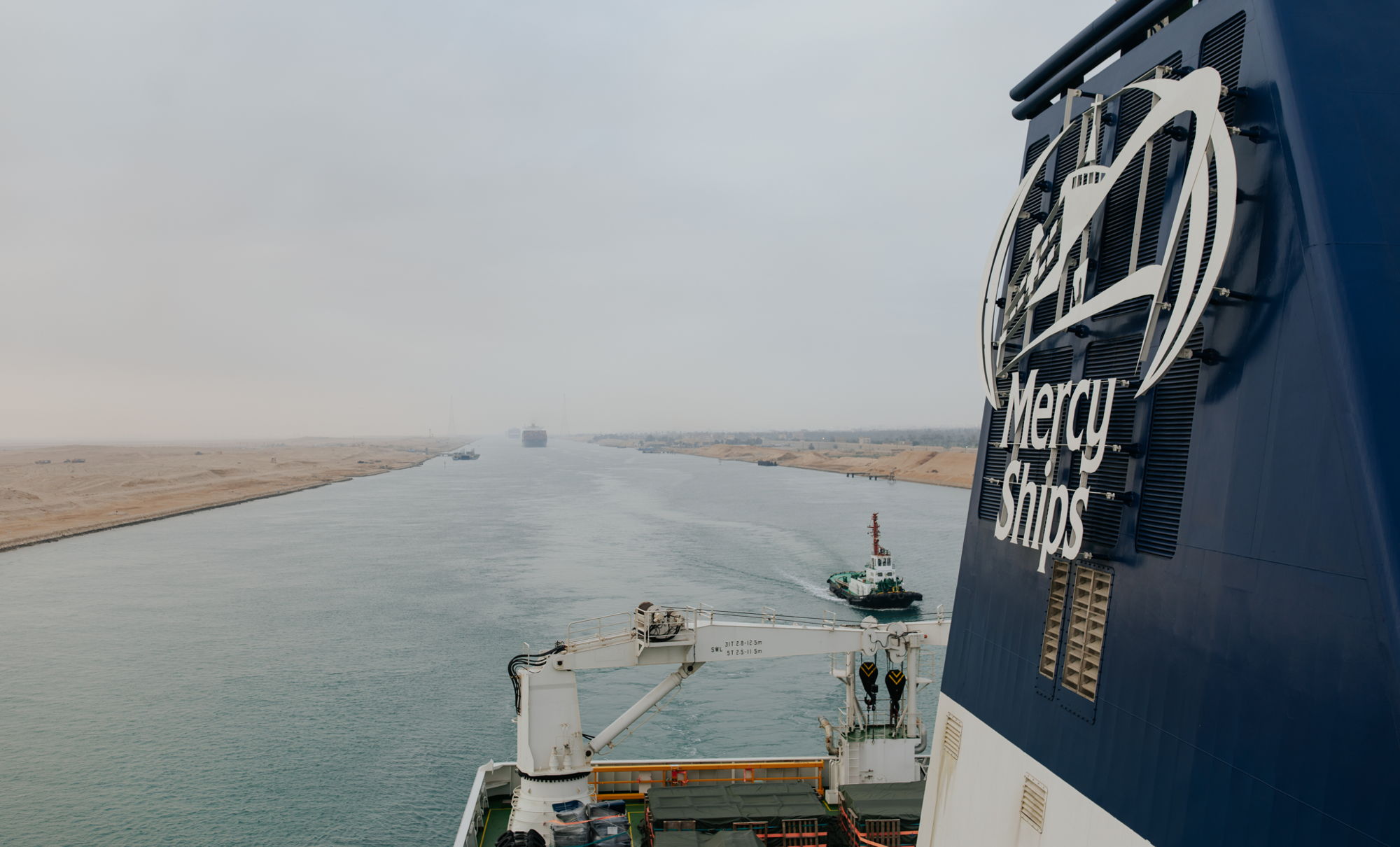 The Global Mercy (R) transited the Suez Canal on the way to Antwerp and plans a courtesy stop in Malta next.  Photo (c) Mercy Ships / Emily FrazierORNING_EF002_HI