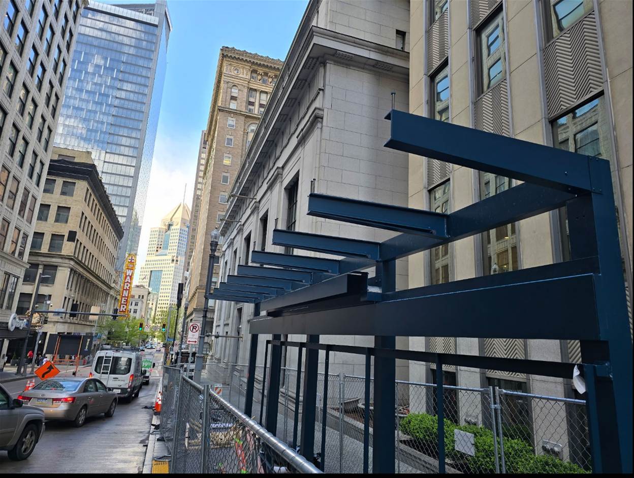 Steel bus shelter frame recently placed at Fifth Avenue and William Penn Place Steel bus shelter frame recently placed at Fifth Avenue and William Penn Place