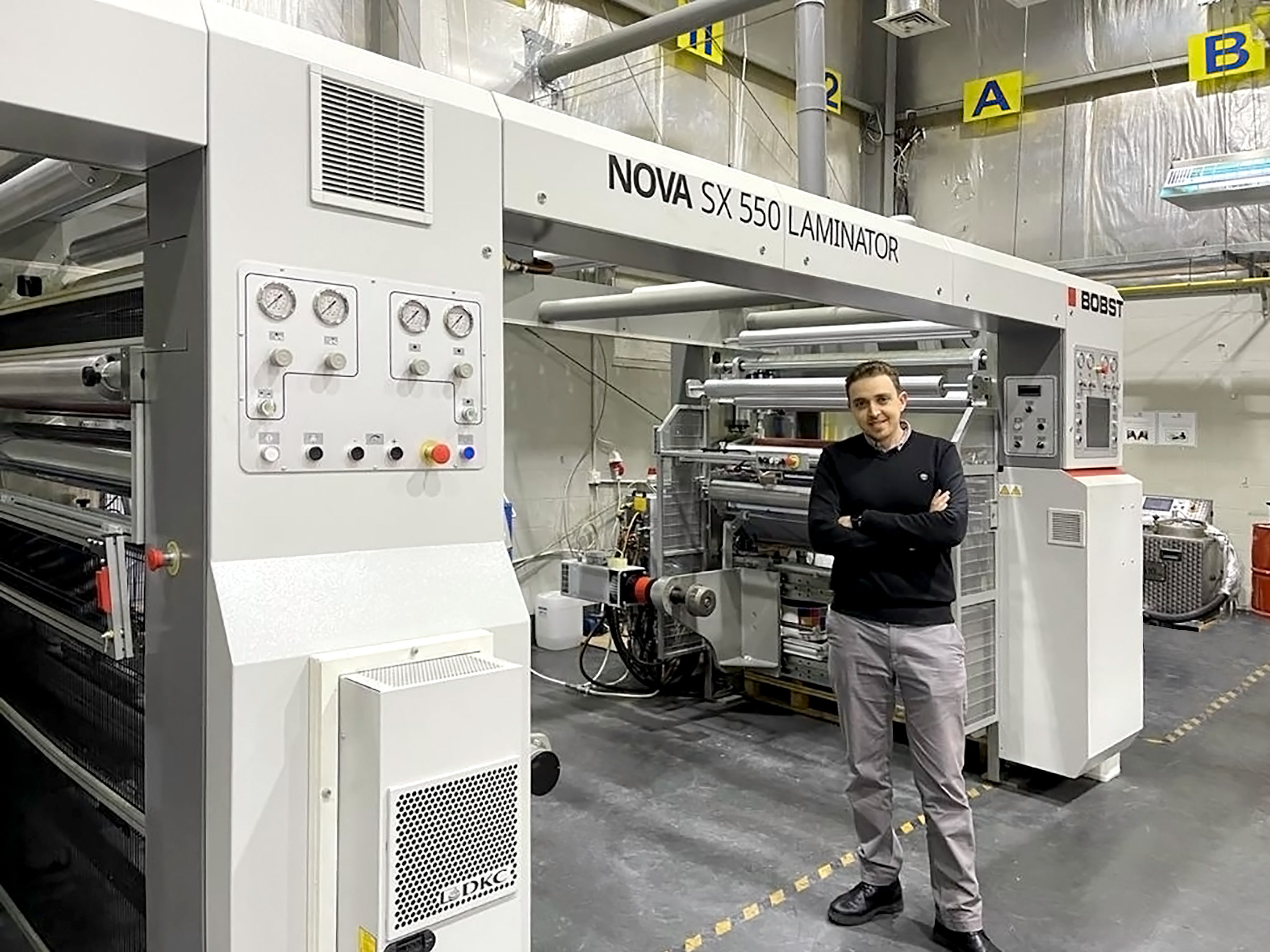 Mr Mohammad Sabha, Plant Manager and Executive Engineer of Digital Labels Jordan in front of the NOVA SX 550 laminator