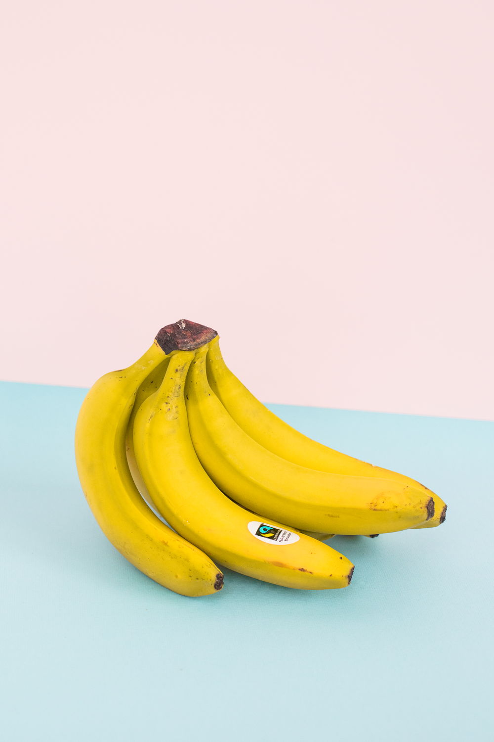 Bananas on blue/pink background