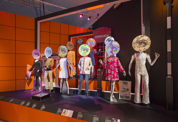 Inside the ‘Revolutions: Records & Rebels’ exhibition, showcasing some of the key fashion pieces on display.  ©Victoria and Albert Museum, London  