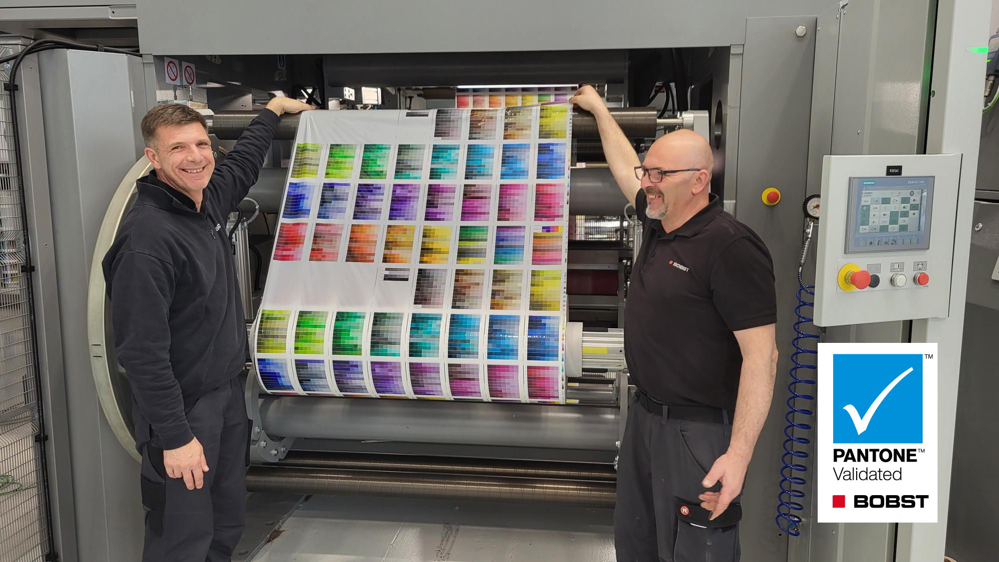 Pantone finger print examination of over 2300 pantone colors - Igor Spalla (left) and Paolo Pozzi (right), Gravure process specialists at Bobst Italia.