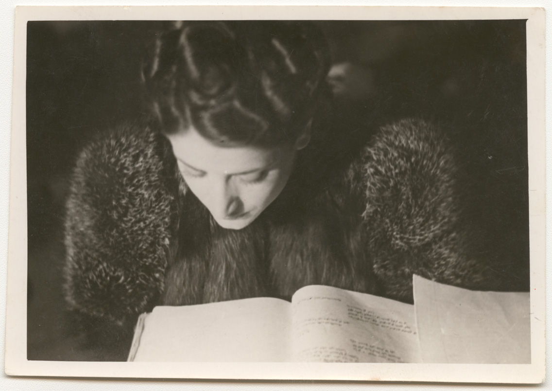 Asmahan reading a script. Taken by an unidentified photographer between 1930 and 1945 in Egypt. Gelatin silver developing-out paper print, 6.6 x 9.4 cm. 0085at00010, 0085at – Faysal el Atrash collection, courtesy of the Arab Image Foundation, Beirut.
