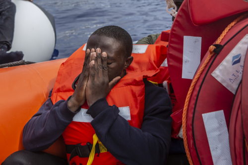 Roughly 200 people from two boats in distress were rescued on the morning of May 9. Everyone is now safe on board the Geo Barents while we continue the search for more boats in distress. Right after the rescue we saw the Libyan Coast Guard navigating at a very close distance from the Geo Barents. Copyright Anna Pantelia/MSF 