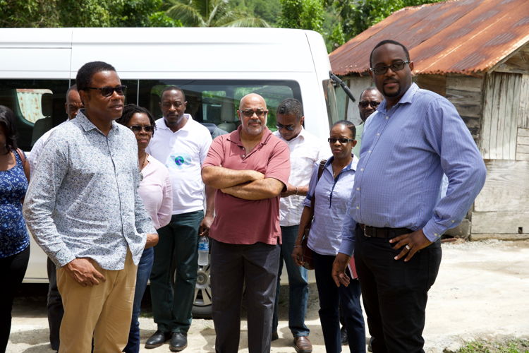 Minister Dean Jonas and OECS Director General Dr. Didacus Jules and a delegation inspect the innovative aquaponics facility.