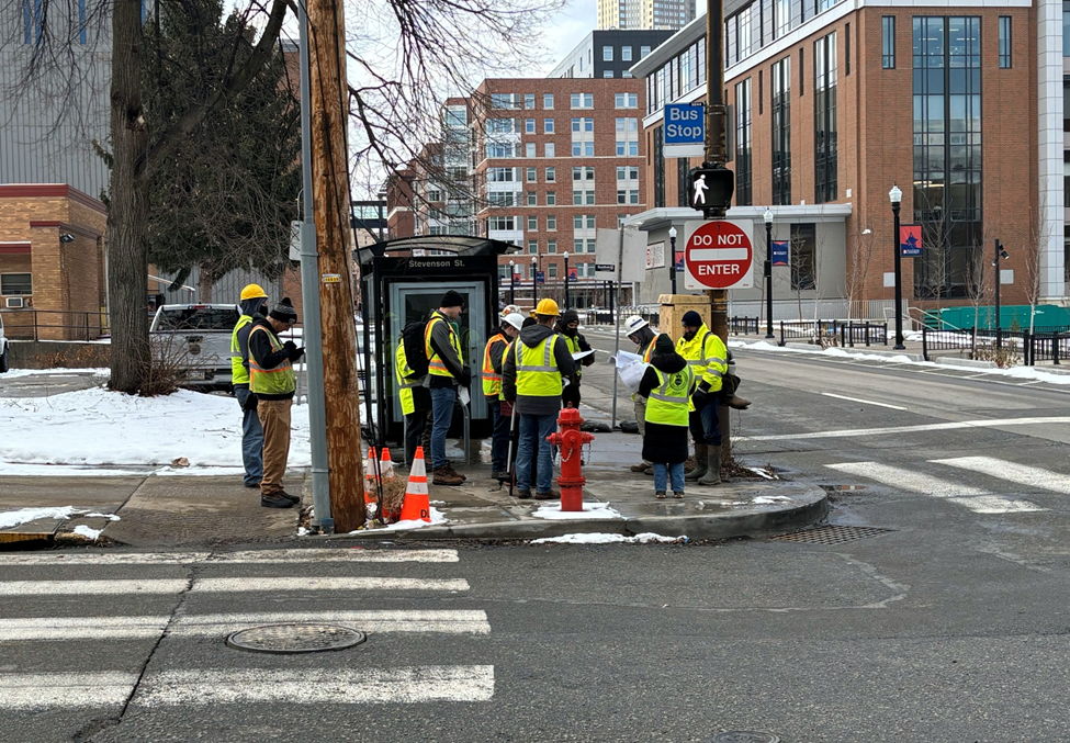 “Pole Spotting” crew at Forbes and Stevenson Street placing sidewalk markings at future traffic signal locations