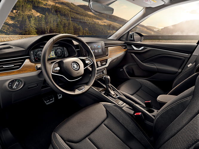 In the interior, the ŠKODA KAMIQ SCOUTLINE boasts a generous amount of space and exclusive decorative trims - with an ash-wood effect as standard and a dark brushed design available as an option - complemented by chrome-style air vents. In the interior, the ŠKODA KAMIQ SCOUTLINE boasts a generous amount of space and exclusive decorative trims - with an ash-wood effect as standard and a dark brushed design available as an option - complemented by chrome-style air vents.