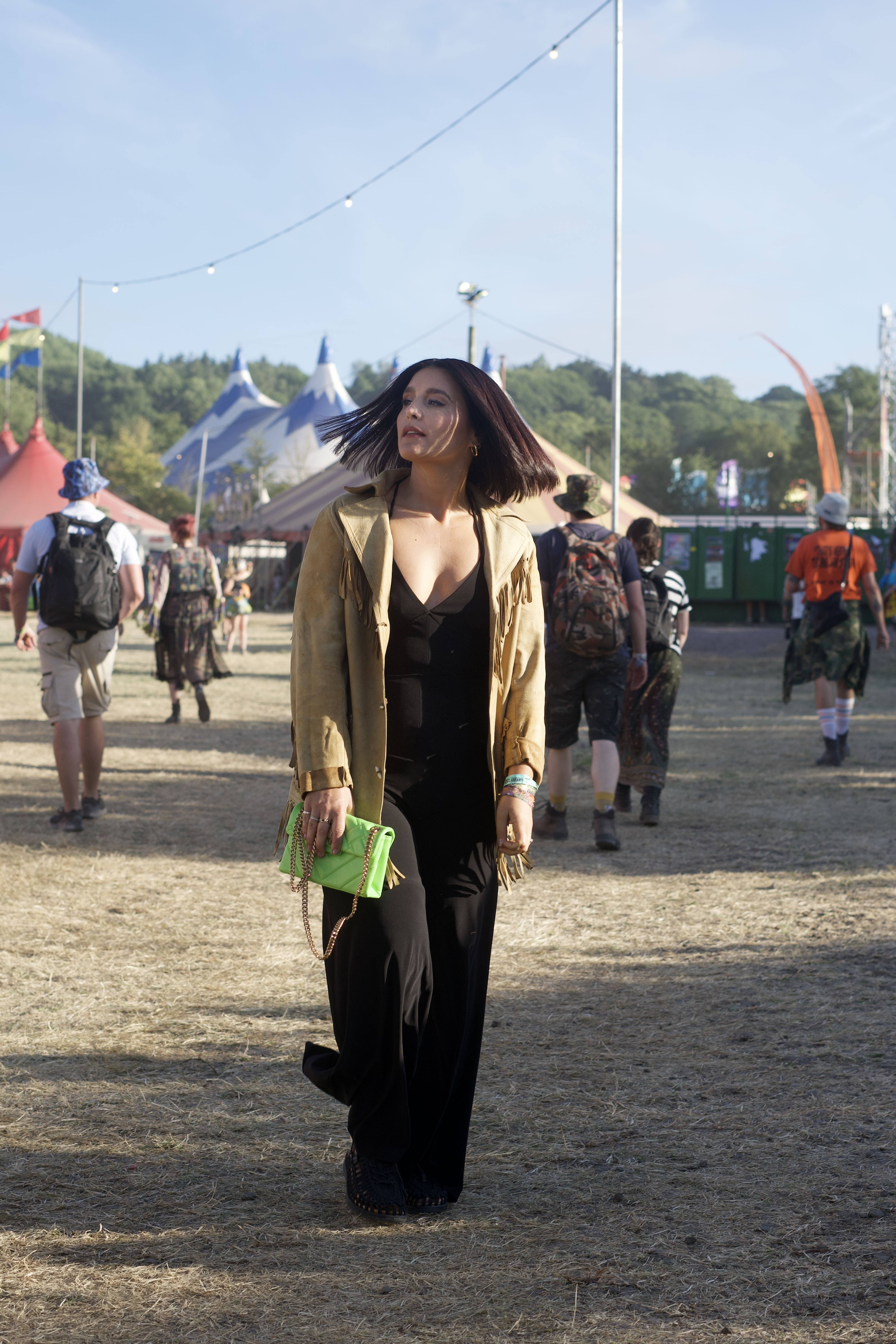 Jessie Ware with the mini leather Kensington bag in green