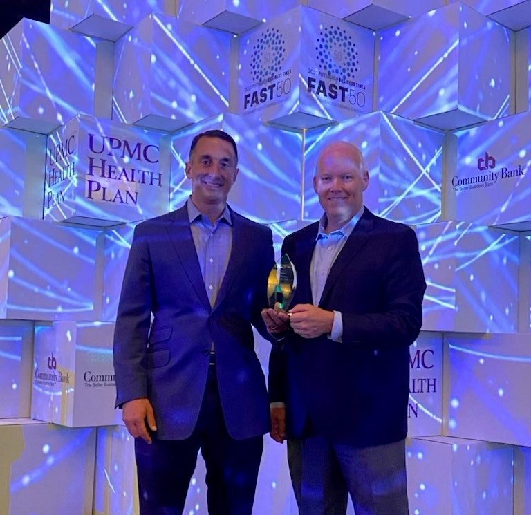 The Efficiency Network (TEN) CEO Troy Geanopulos (left) and COO Rob Campbell pose after at Pittsburgh Business Times' "Fast 50" awards on Thursday, Aug. 26, 2021 at the Westin in Downtown Pittsburgh.