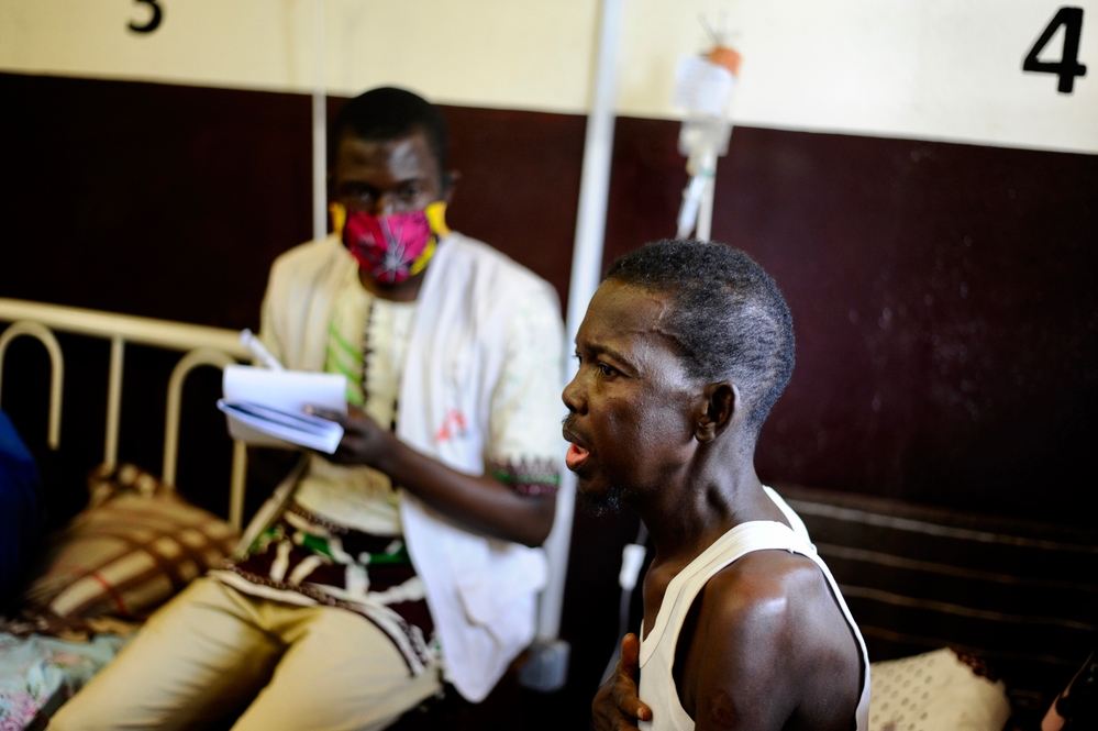 abrice (right), 49 year old, is one of the first patients cared for in the advanced HIV service of the Centre Hospitalier Universitaire Communautaire (CHUC). He has just been admitted again following complications linked to an opportunist infection. He is doing haute couture and lives with his wife and children. “I have been living with this disease for the past 10 years. My wife and my relatives have accepted me with the virus. Since all these years, all the tests my wife had to do were negative. Yes, my wife is HIV-negative and so does our last daughter. I understood many things since I receive care here. I do not feel shameful or down anymore because of others people's stigmatization. Photographer: Marco  Scardovi