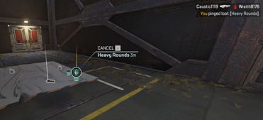 A player uses the Ping System in Apex Legends™ to alert their team of the presence of some “Heavy Rounds” of ammunition.