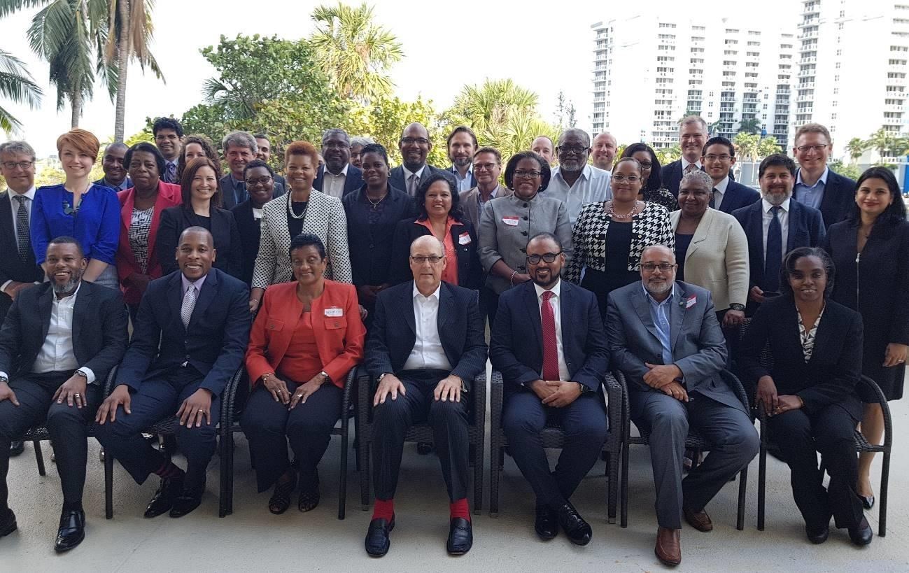 Participants at the CCRIF Stakeholder Retreat, held March 19 2018 in Miami, USA. Font row (L-R): Mr. Ronald Jackson, Executive Director CDEMA; CCRIF Board Members, Mr. Timothy Antoine and Mrs. Desirée Cherebin; CCRIF Chairman, Mr. Milo Pearson; CCRIF CEO, Mr. Isaac Anthony; H.E. Dr. Didacus Jules, Director General, OECS; Mrs. Faye Hardy, CCRIF Board Member. Other participants were from ministries of finance in CCRIF member countries, regional organizations, international development partners and the CCRIF Team.